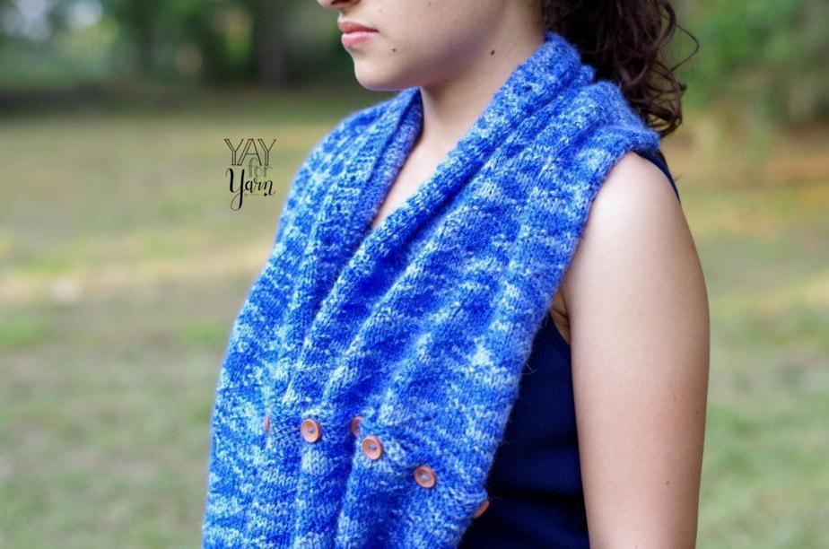 This Infinity Scarf can unbutton to become a regular scarf, or button together to become a poncho!