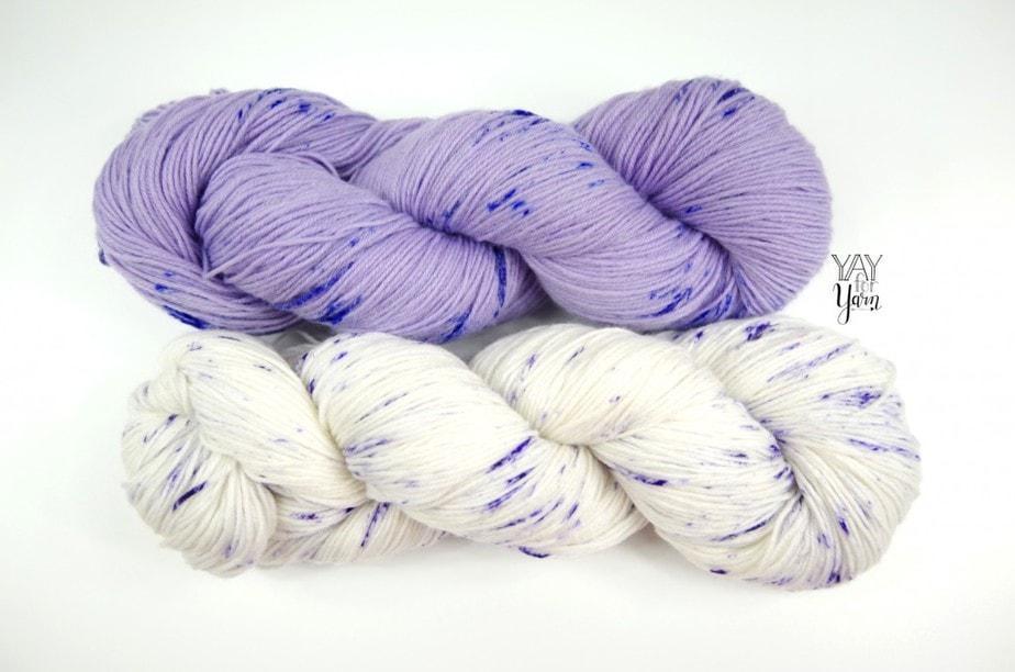 two skeins of KnitPicks Stroll Limited Edition Sock Lab yarn