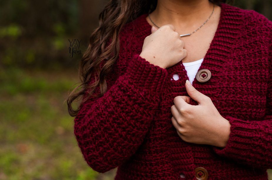 closeup of shoulder - crimson red / burgundy crochet cardigan