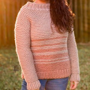 girl outdoors wearing beige / terracotta dip dye sweater at golden hour