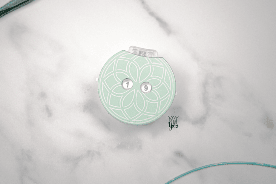 light green click style row counter for knitting