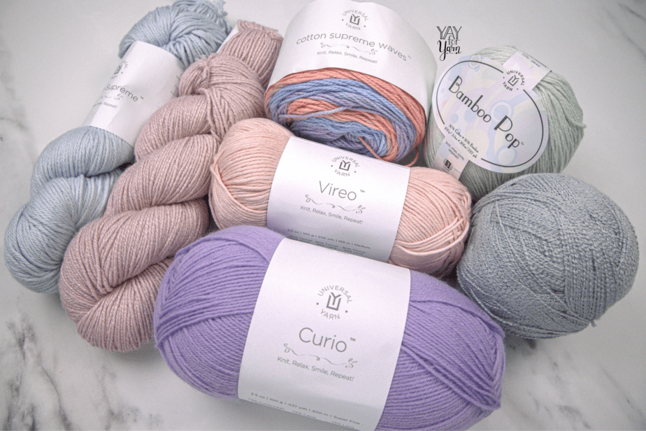 7 colors of universal yarn with white marble background